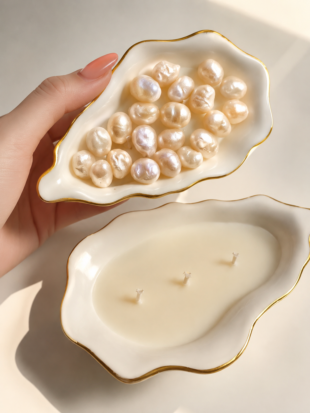Handcrafted oyster shell candle holder with a hand-poured pearl candle